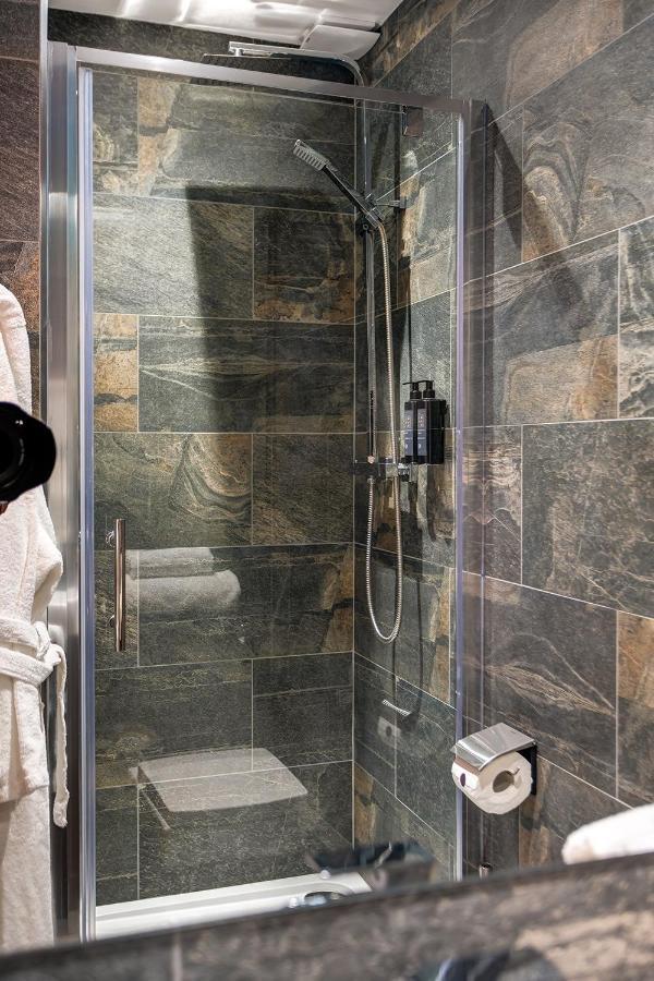Kotel Windermere Exterior foto A shower enclosure